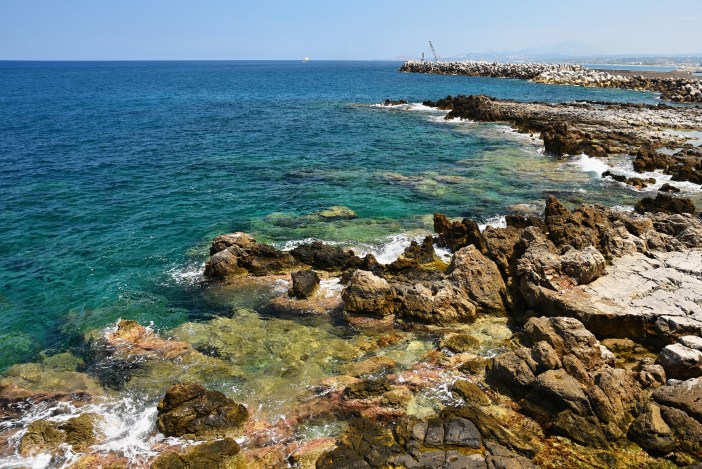 Beautiful clean sea and waves. Summer background for travel and holidays. Greece Crete.. Amazing scenery on the beach.